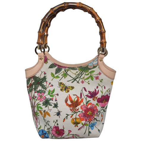 gucci floral floa bamboo handbag vintage|Gucci vintage bamboo handle handbag.